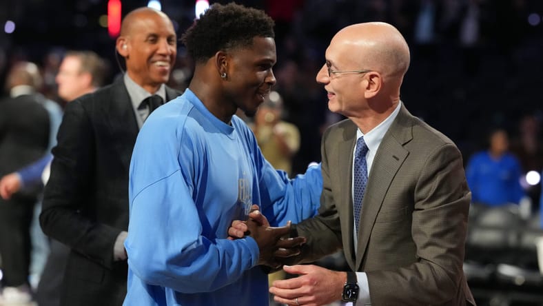Minnesota Timberwolves Anthony Edwards embracing NBA commissioner Adam Silver after winning 2026 NBA All-Star Game MVP