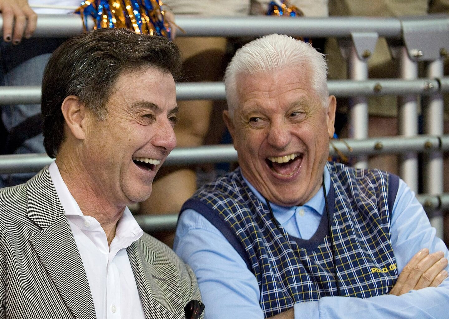 Rick Pitino (left) and Mr. Donovan (right) enjoyed a college basketball game together in 2009.
