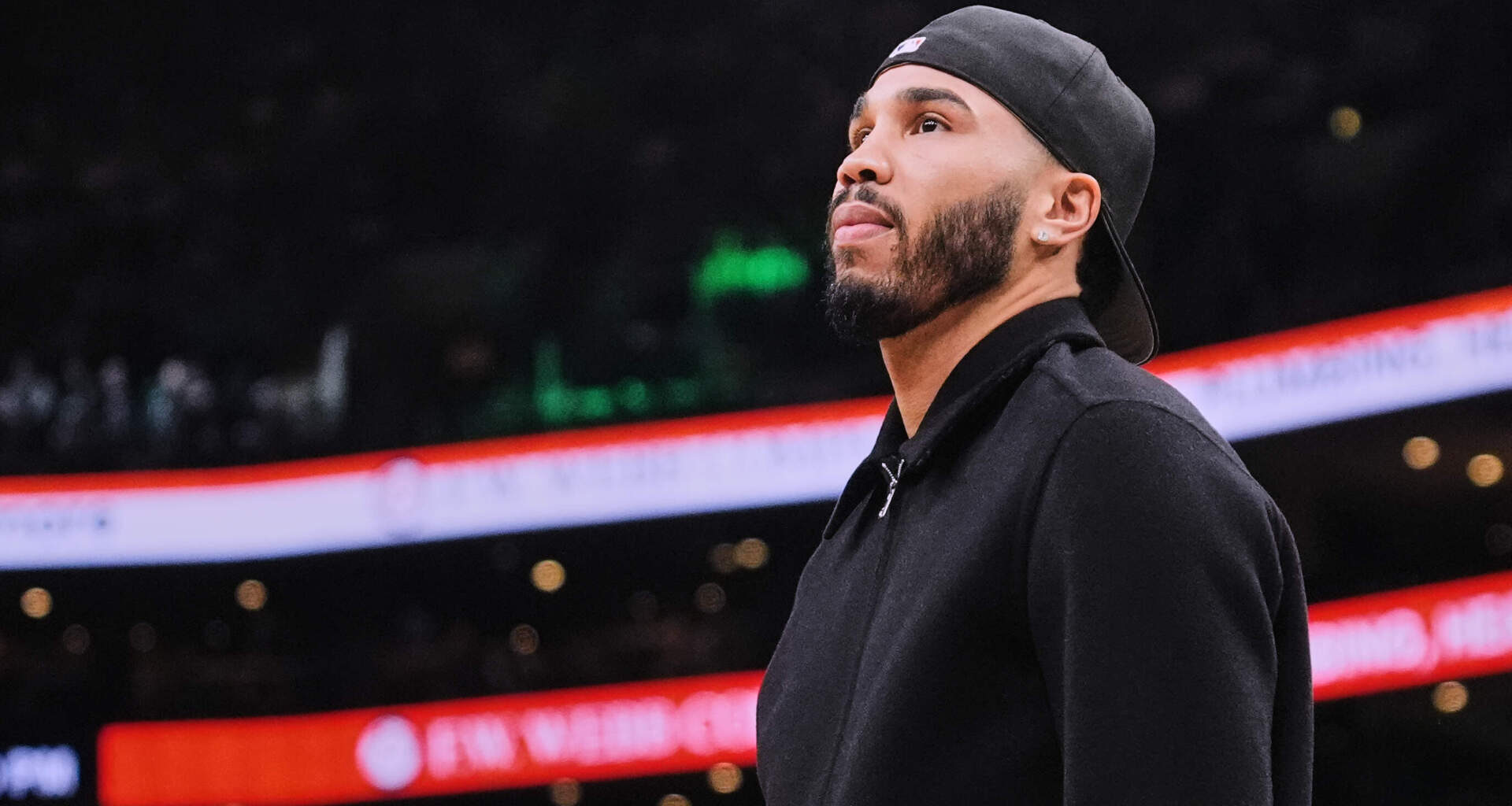 Boston Celtics forward Jayson Tatum stands near the bench during a time out in the first half of an NBA basketball game against the Denver Nuggets, Wednesday, Jan. 7, 2026, in Boston. (Charles Krupa/AP)
