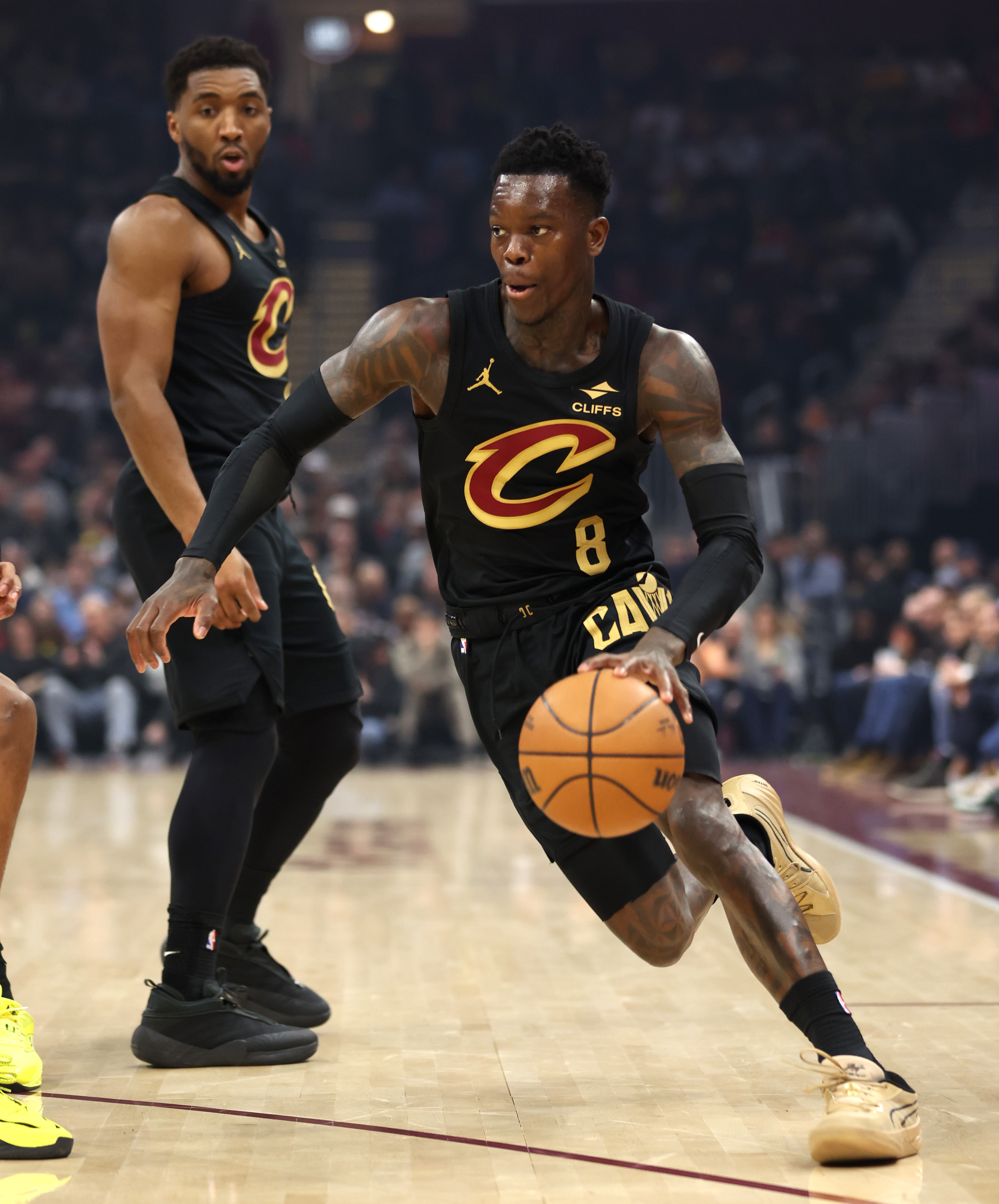 Cleveland Cavaliers guard Dennis Schroder drives to the paint against the Washington Wizards in the first half of play. 