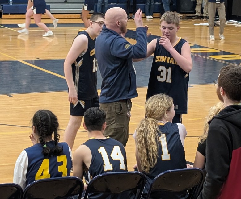 Coach Matthew Harris brings C.J. Anderson and Josiah Wisenburg in for a break.