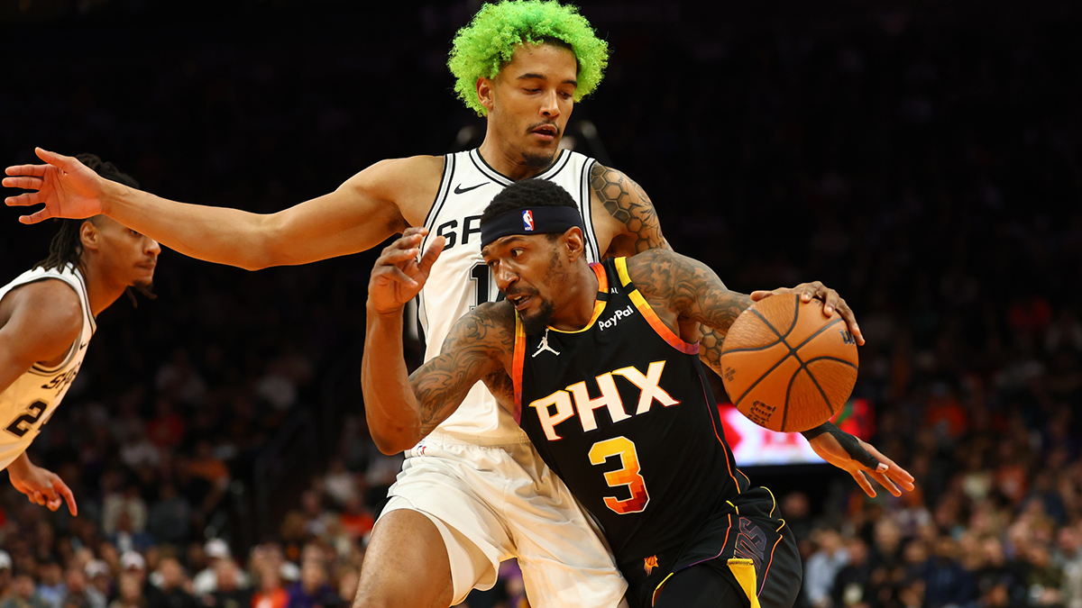 Phoenix Suns guard Bradley Beal (3) controls the ball against San Antonio Spurs forward Jeremy Sochan in the second half of an NBA Cup game at Footprint Center.