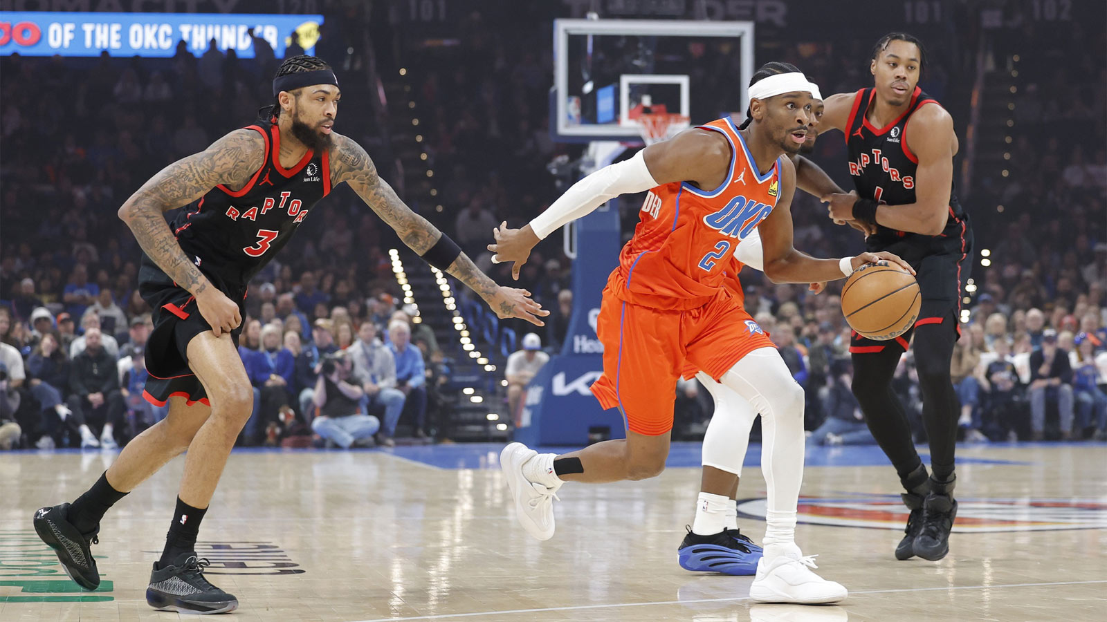 Raptors forward Brandon Ingram (3) and Toronto Raptors guard Scottie Barnes (4) during the first quarter at Paycom Center