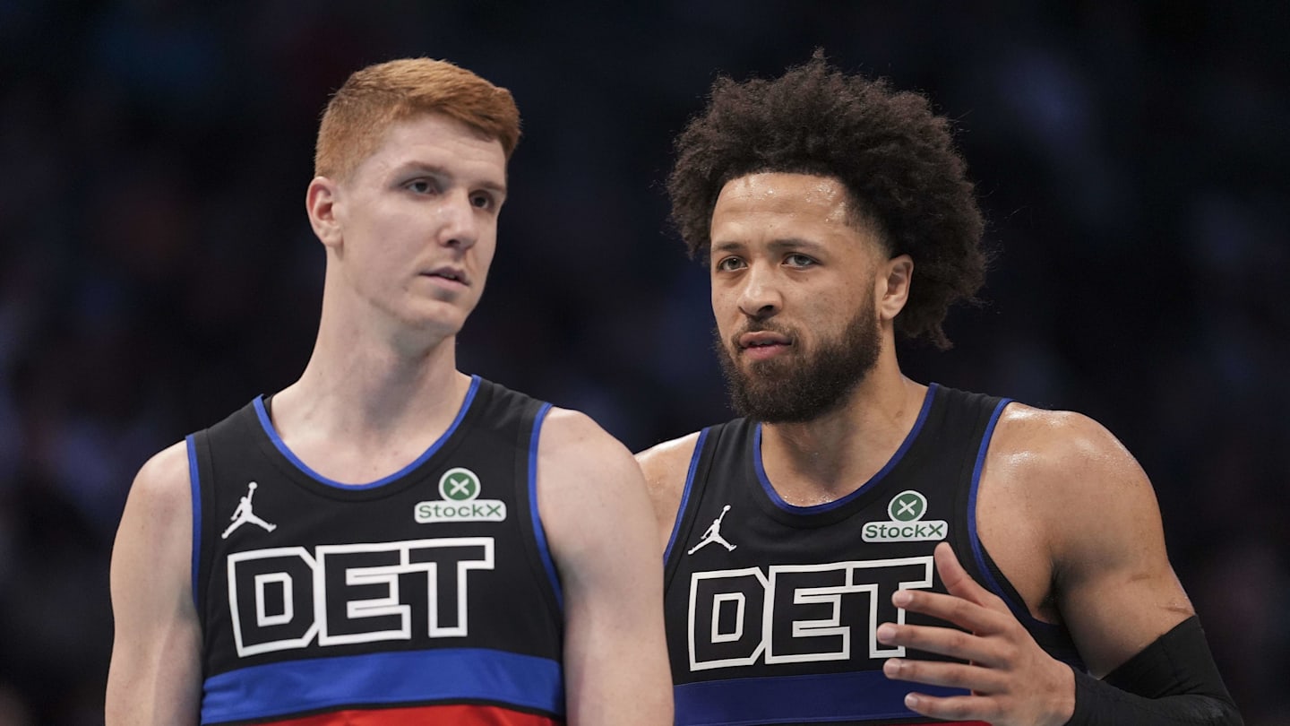 Feb 9, 2026; Charlotte, North Carolina, USA;Detroit Pistons guard Cade Cunningham (2) talks with guard Kevin Huerter (27) as he enters the game against the Charlotte Hornets during the second quarter at Spectrum Center. Mandatory Credit: Jim Dedmon-Imagn Images