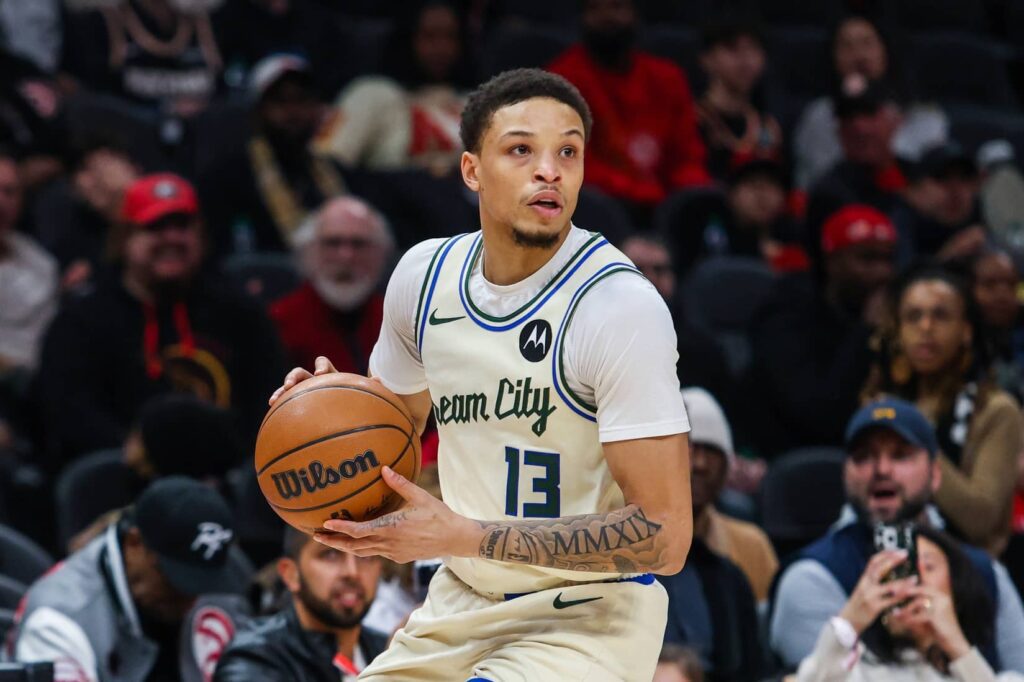 Jan 19, 2026; Atlanta, Georgia, USA; Milwaukee Bucks guard Ryan Rollins (13) looks to pass the ball against the Atlanta Hawks during the first quarter at State Farm Arena. Mandatory Credit: Jordan Godfree-Imagn Images