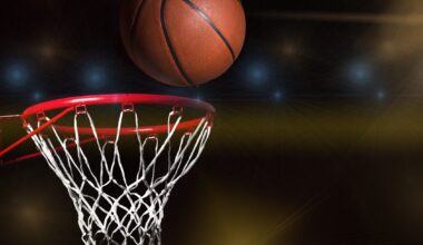 NBA star Isiah Thomas slam dunks with two kosher Champagnes