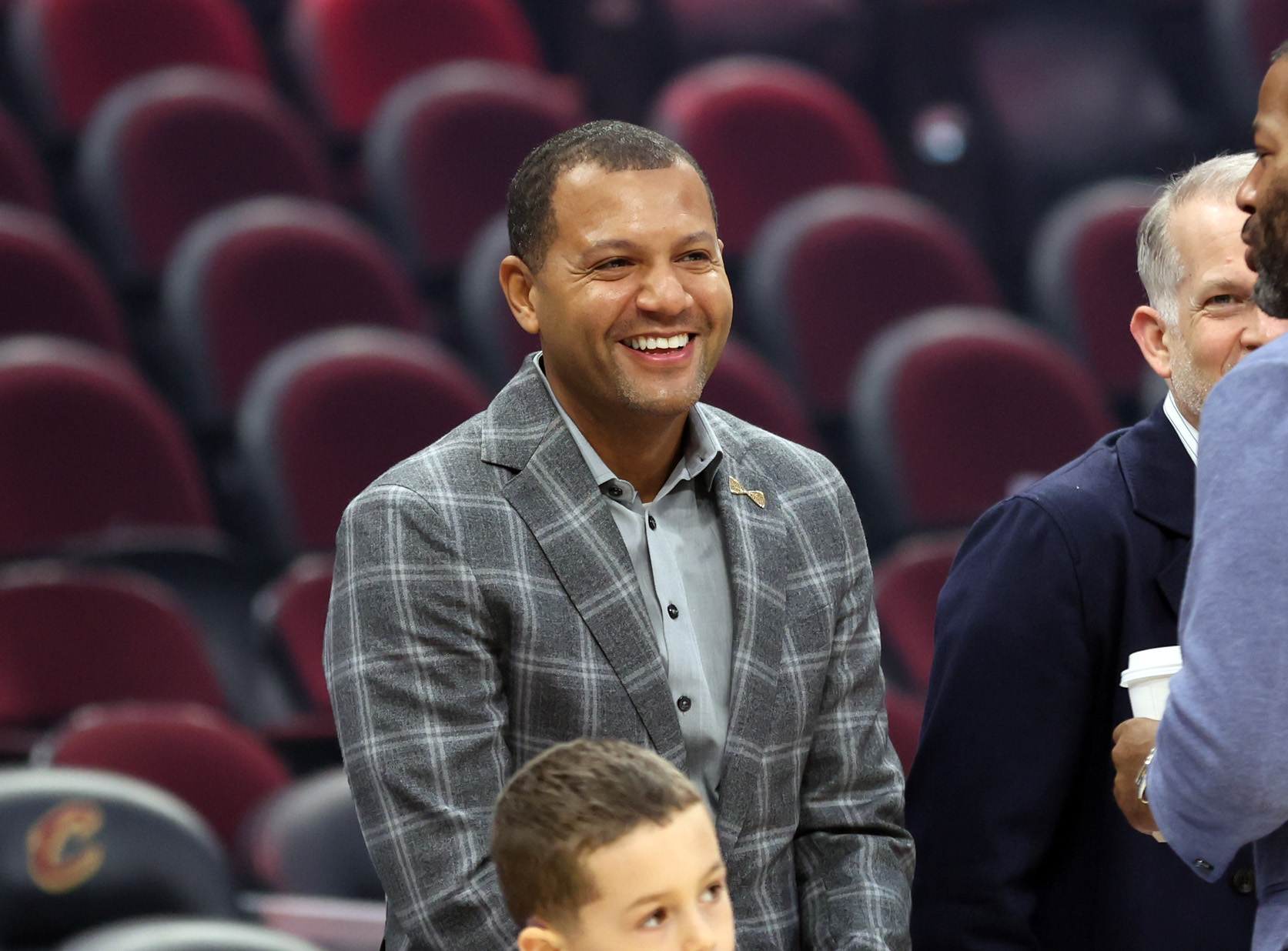 Cleveland Cavaliers president of basketball operations Koby Altman smiles on the sidelines before the game against the Washington Wizards. 