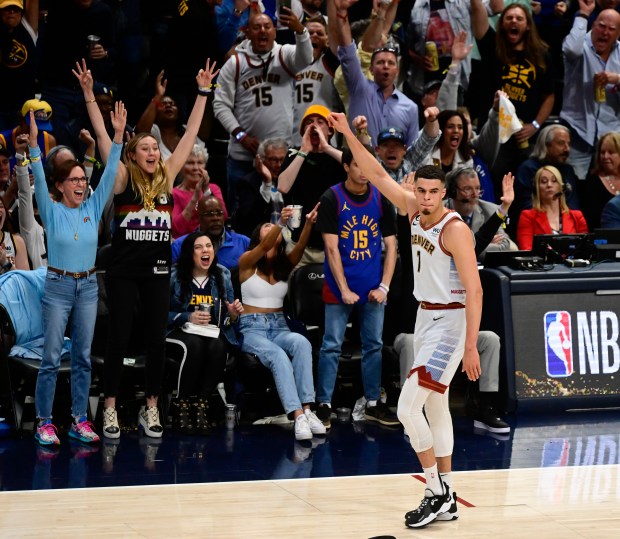 Michael Porter Jr. (1) of the Denver Nuggets moments after sinking a 3-point basket against the Miami Heat in the third quarter during Game 5 of the NBA Finals at Ball Arena June 12, 2023. (Photo by Andy Cross/The Denver Post)