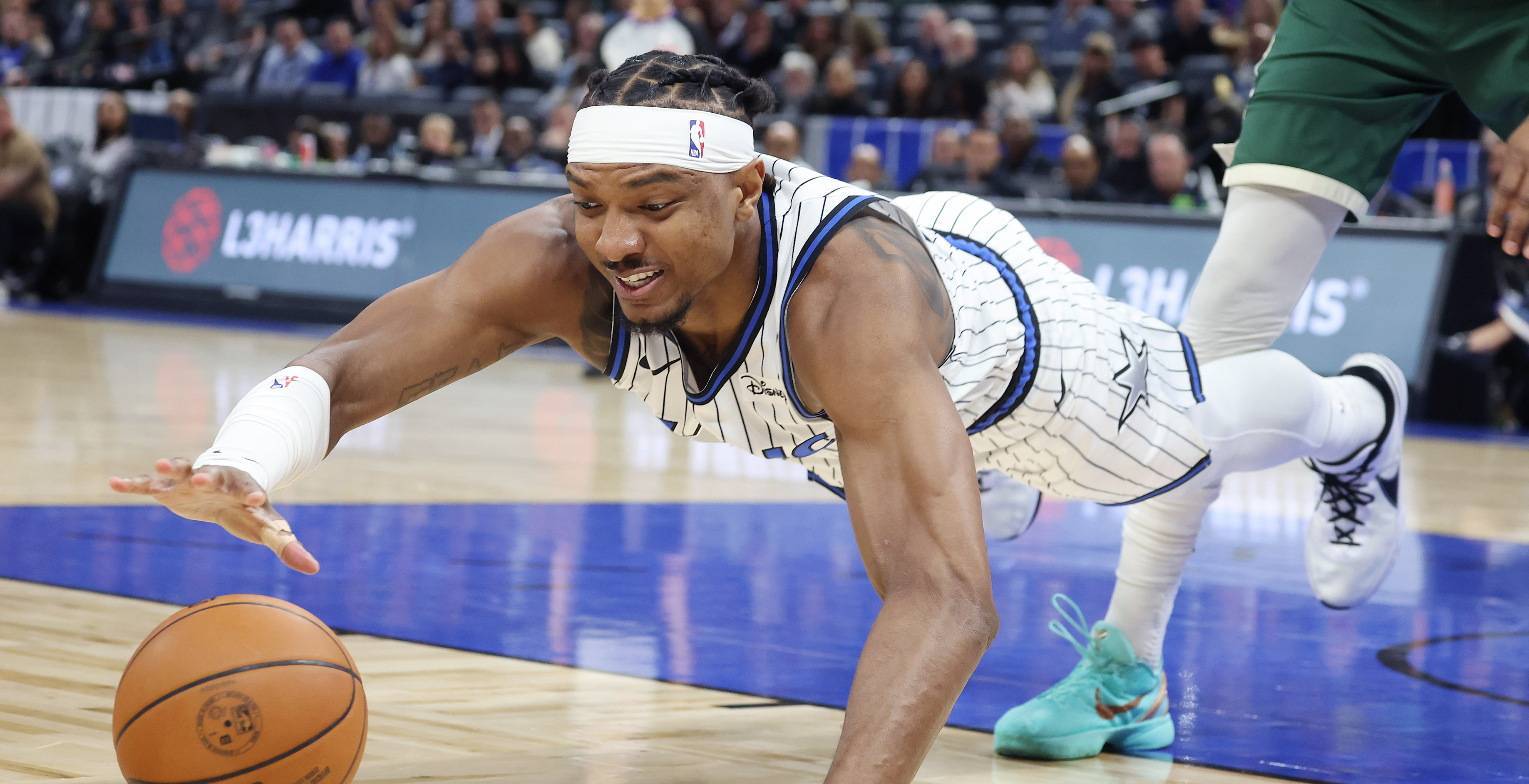 Orlando center Wendell Carter Jr. dives for the ball during...