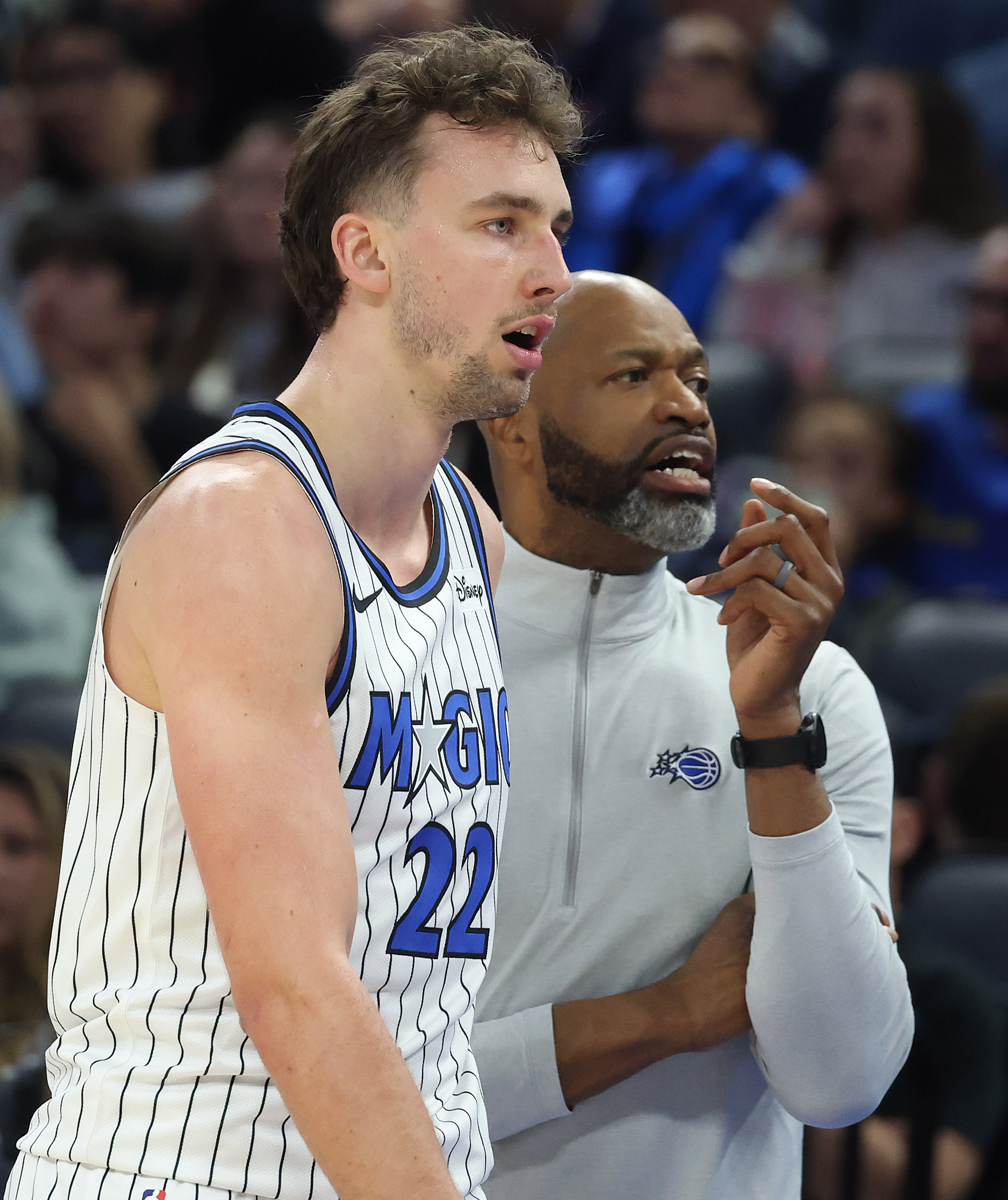 Orlando forward Franz Wagner and head coach Jamahl Mosley are...