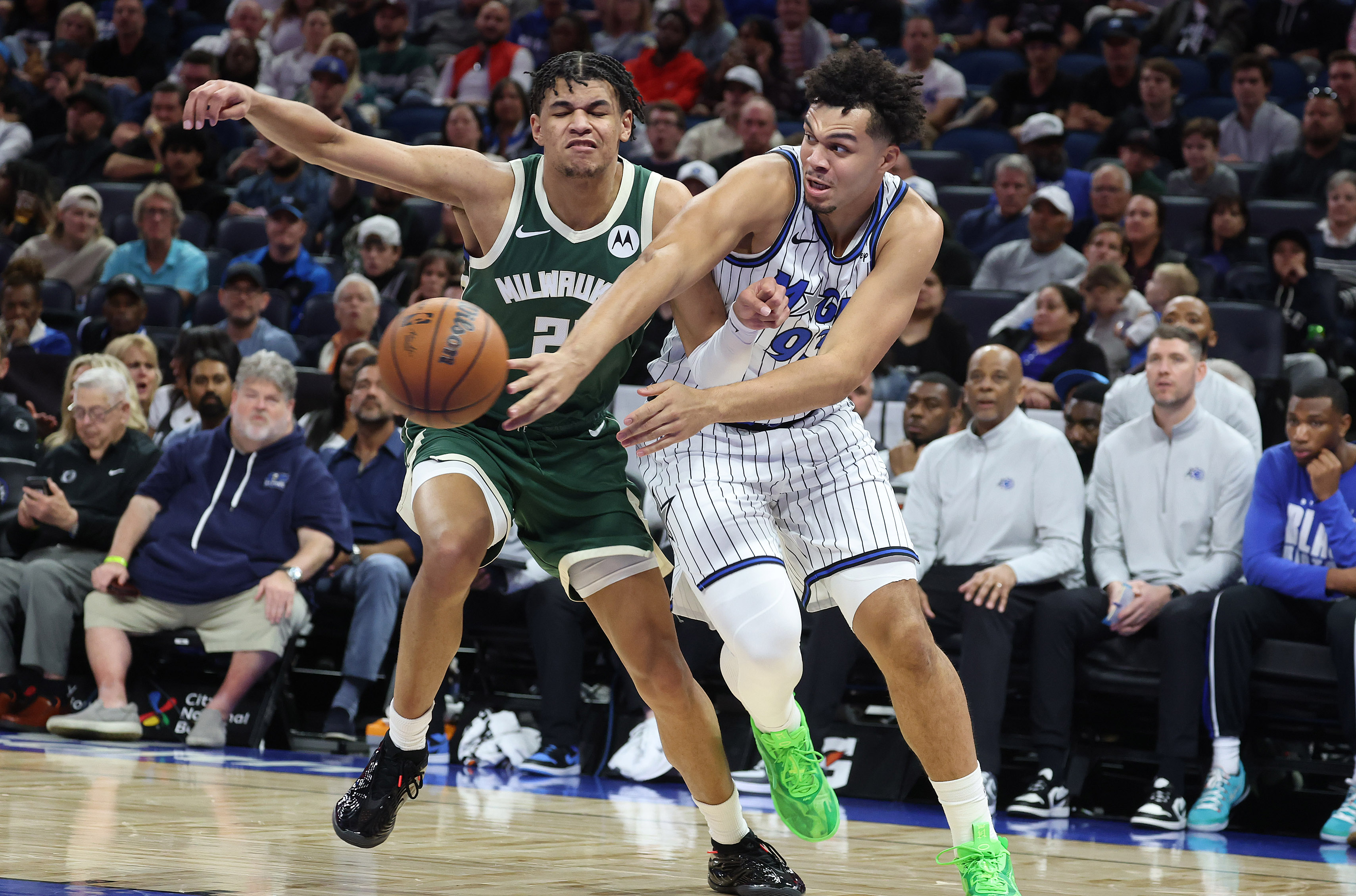 Orlando forward Noah Penda (93) passes around Milwaukee forward Ousmane...