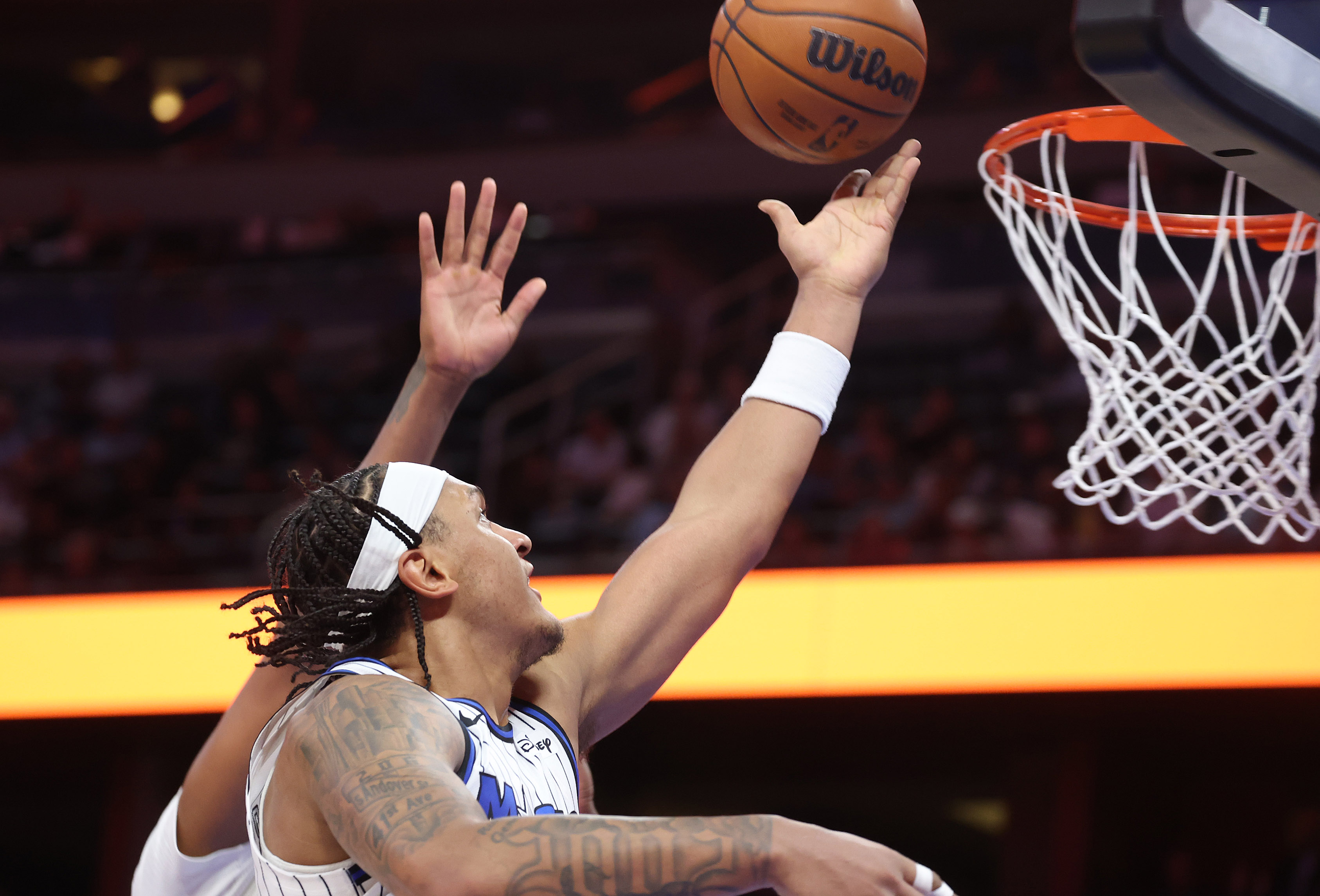 Orlando forward Paolo Banchero scores during the Milwaukee Bucks at...
