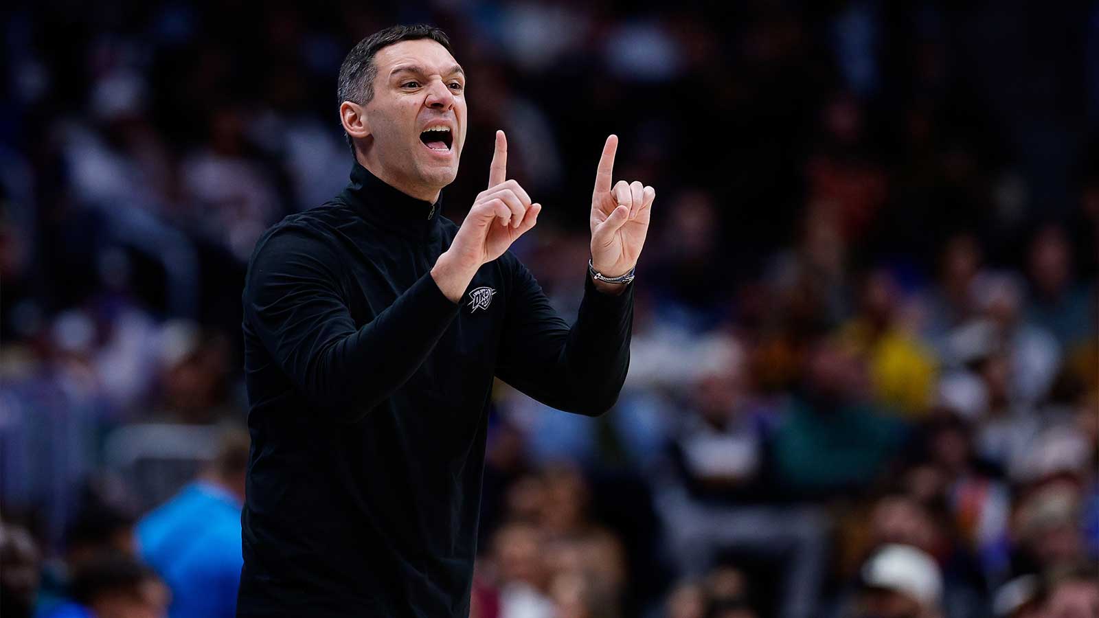 Oklahoma City Thunder head coach Mark Daigneault gestures in the fourth quarter against the Denver Nuggets at Ball Arena.