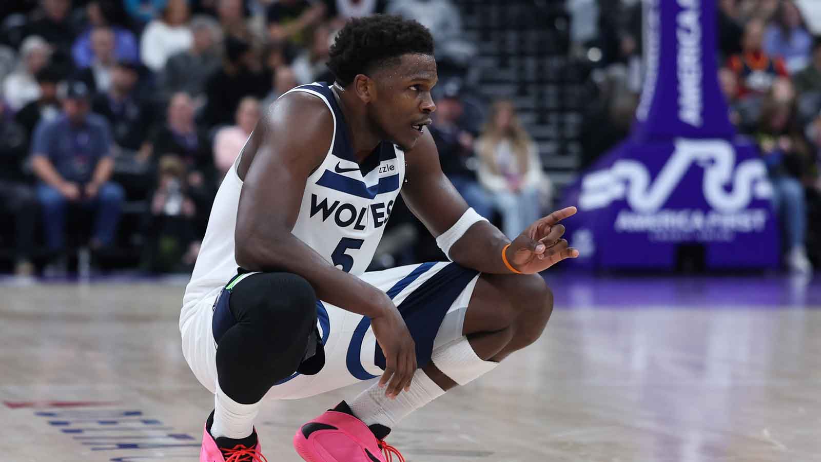 Minnesota Timberwolves guard Anthony Edwards (5) reacts during a break in action against the Utah Jazz during the second half at Delta Center.