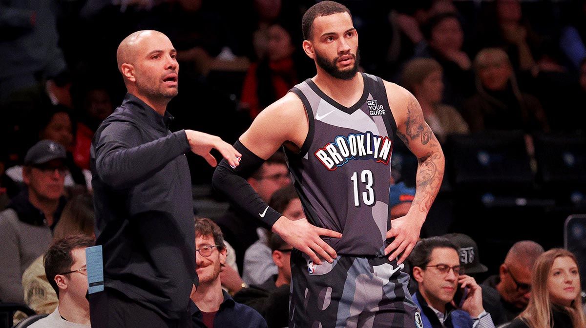 Brooklyn Nets head coach Jordi Fernandez talks to guard Tyrese Martin (13) during the first quarter against the Philadelphia 76ers at Barclays Center.