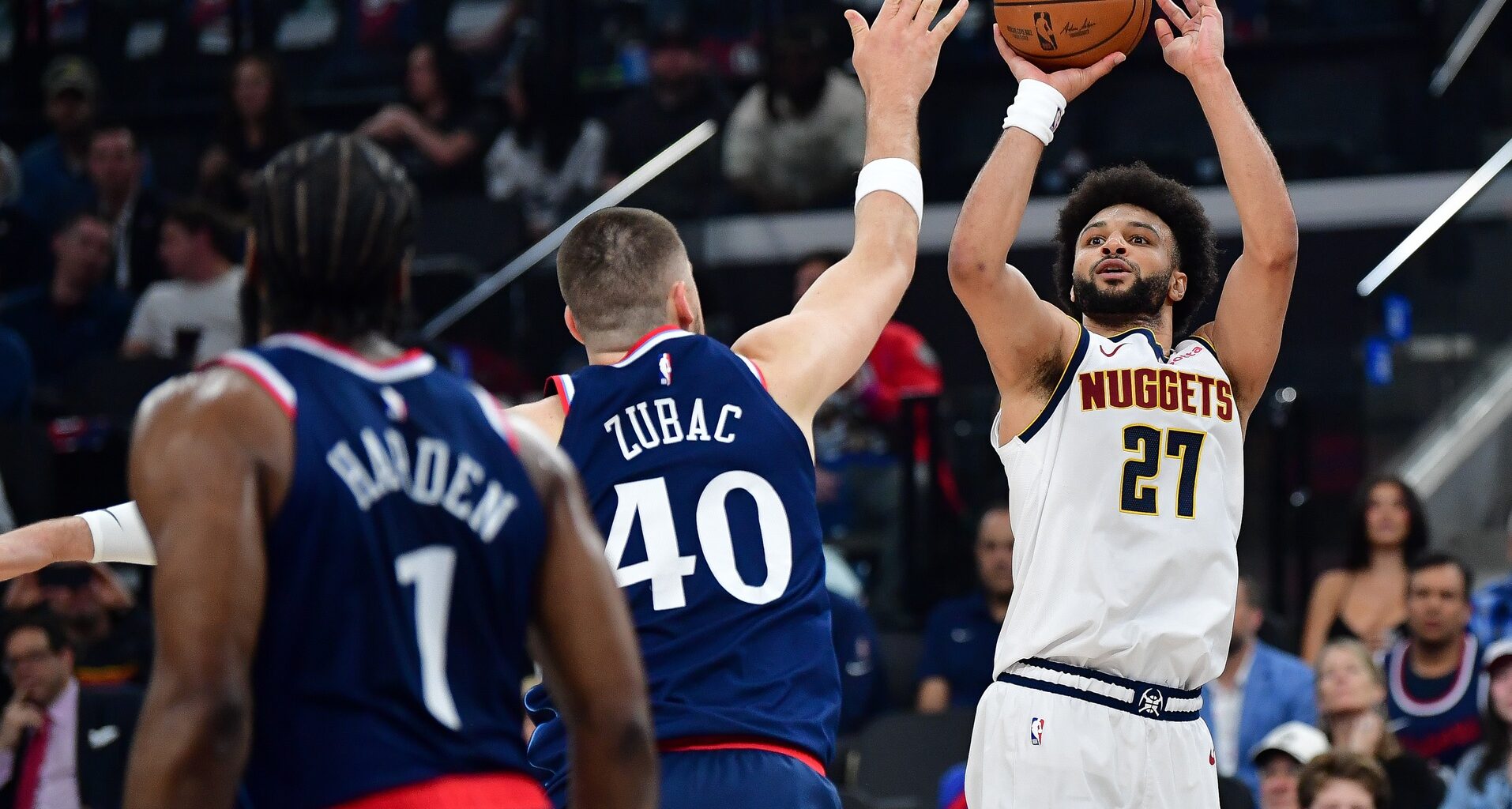Apr 24, 2025; Inglewood, California, USA; Denver Nuggets guard Jamal Murray (27) shoots against Los Angeles Clippers center Ivica Zubac (40) during the first half of game three in the first round for the 2024 NBA Playoffs at Intuit Dome. Mandatory Credit: Gary A. Vasquez-Imagn Images