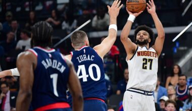 Apr 24, 2025; Inglewood, California, USA; Denver Nuggets guard Jamal Murray (27) shoots against Los Angeles Clippers center Ivica Zubac (40) during the first half of game three in the first round for the 2024 NBA Playoffs at Intuit Dome. Mandatory Credit: Gary A. Vasquez-Imagn Images