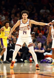 Oct 14, 2025; Phoenix, Arizona, USA; Phoenix Suns and Valley Suns guard Koby Brea (14) against the Los Angeles Lakers during an NBA preseason game at Mortgage Matchup Center. Mandatory Credit: Mark J. Rebilas-Imagn Images