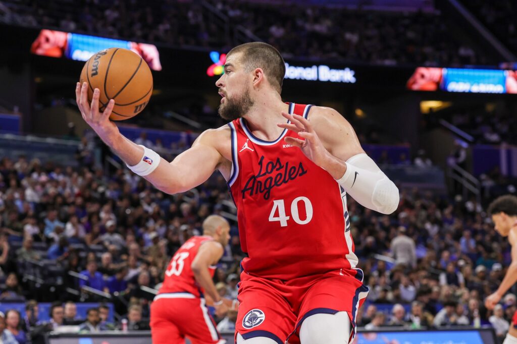 Nov 20, 2025; Orlando, Florida, USA; LA Clippers center Ivica Zubac (40) grabs the rebound during the second quarter against the Orlando Magic at Kia Center. Mandatory Credit: Mike Watters-Imagn Images