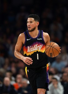 Jan 9, 2026; Phoenix, Arizona, USA; Phoenix Suns guard Devin Booker (1) against the New York Knicks at Mortgage Matchup Center. Mandatory Credit: Mark J. Rebilas-Imagn Images