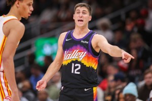 Jan 23, 2026; Atlanta, Georgia, USA; Phoenix Suns guard Collin Gillespie (12) in action against the Atlanta Hawks in the fourth quarter at State Farm Arena. Mandatory Credit: Brett Davis-Imagn Images