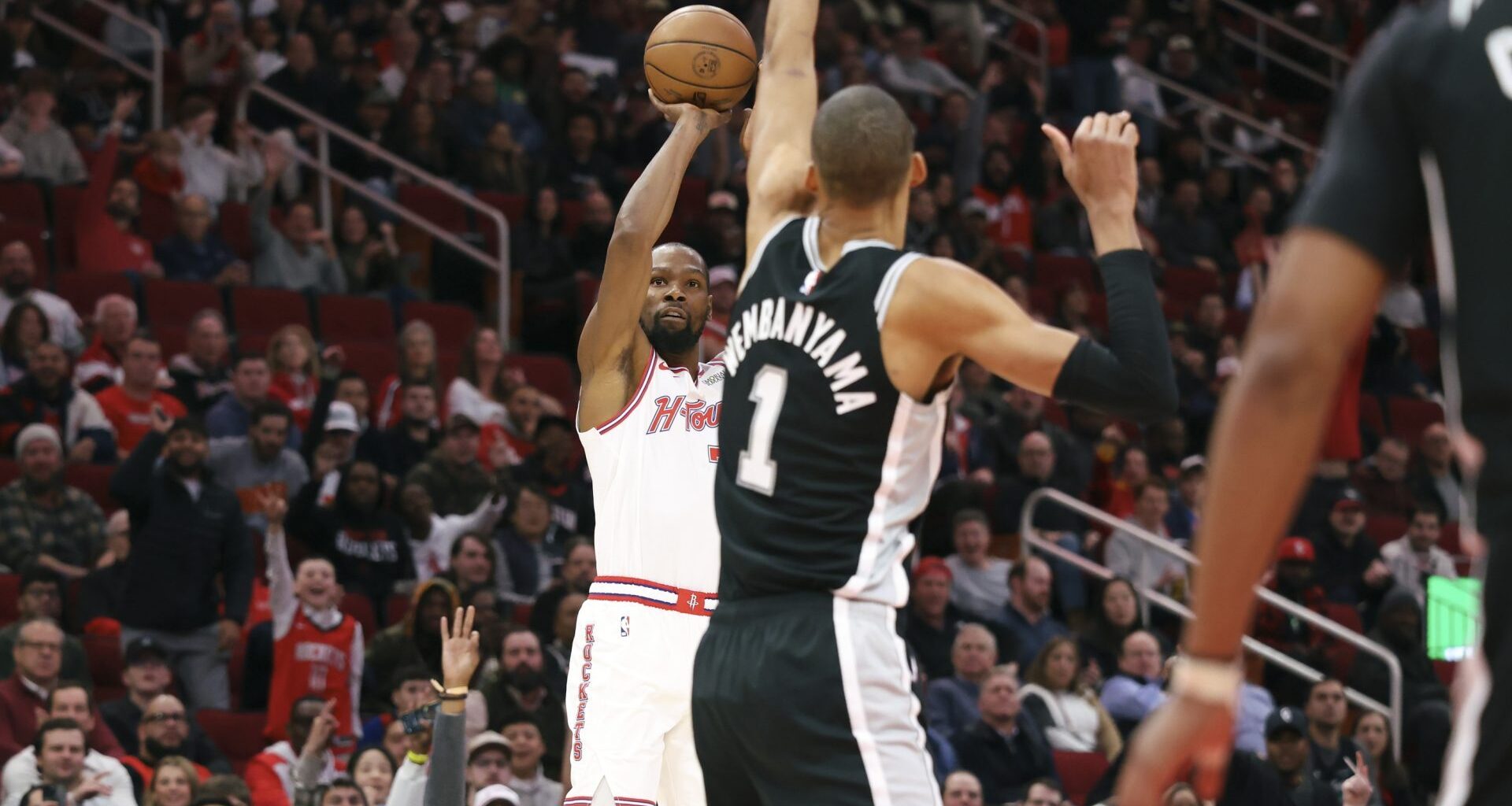 Jan 28, 2026; Houston, Texas, USA; Houston Rockets forward Kevin Durant (7) shoots the ball as San Antonio Spurs forward Victor Wembanyama (1) defends during the first quarter at Toyota Center.