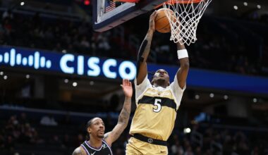 Feb 1, 2026; Washington, District of Columbia, USA; Washington Wizards guard Jamir Watkins (5) dunks over Sacramento Kings guard DeMar DeRozan (10) during the first half at Capital One Arena. Mandatory Credit: Daniel Kucin Jr.-Imagn Images