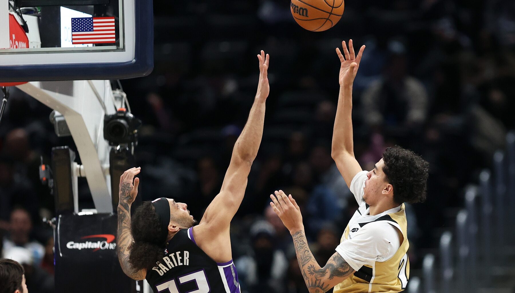 Feb 1, 2026; Washington, District of Columbia, USA; Washington Wizards guard Will Riley (27) takes a shot over Sacramento Kings guard Devin Carter (22) during the second half at Capital One Arena. Mandatory Credit: Daniel Kucin Jr.-Imagn Images