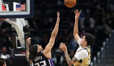 Feb 1, 2026; Washington, District of Columbia, USA; Washington Wizards guard Will Riley (27) takes a shot over Sacramento Kings guard Devin Carter (22) during the second half at Capital One Arena. Mandatory Credit: Daniel Kucin Jr.-Imagn Images