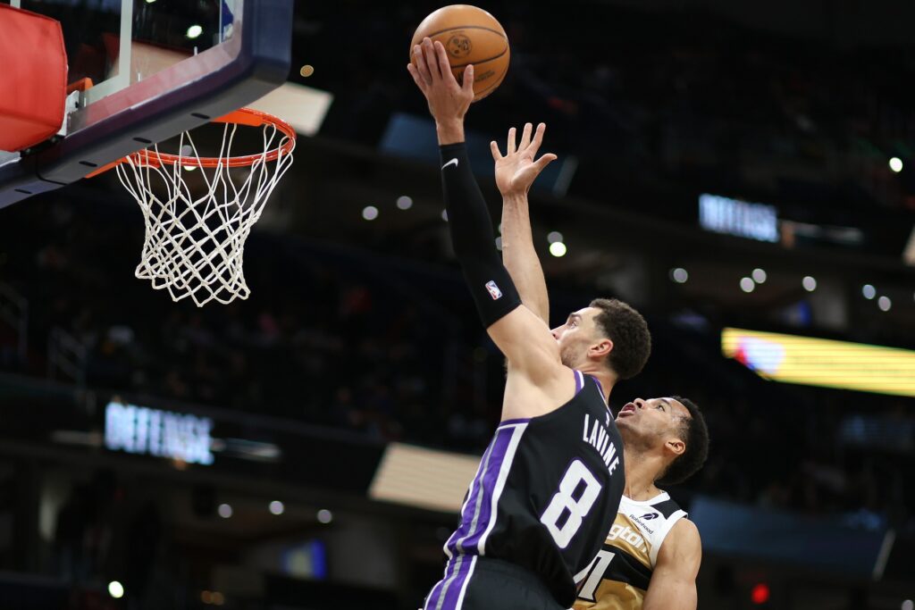 Feb 1, 2026; Washington, District of Columbia, USA; Sacramento Kings guard Zach LaVine (8) takes a shot over Washington Wizards center Skal Labissiere (17) during the second half at Capital One Arena. Mandatory Credit: Daniel Kucin Jr.-Imagn Images