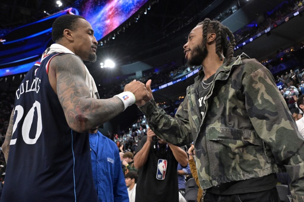 Feb 4, 2026; Inglewood, California, USA; Los Angeles Clippers Darius Garland is greeted by Los Angeles Clippers forward John Collins (20) during the game against the Cleveland Cavaliers at Intuit Dome. Mandatory Credit: Jayne Kamin-Oncea-Imagn Images