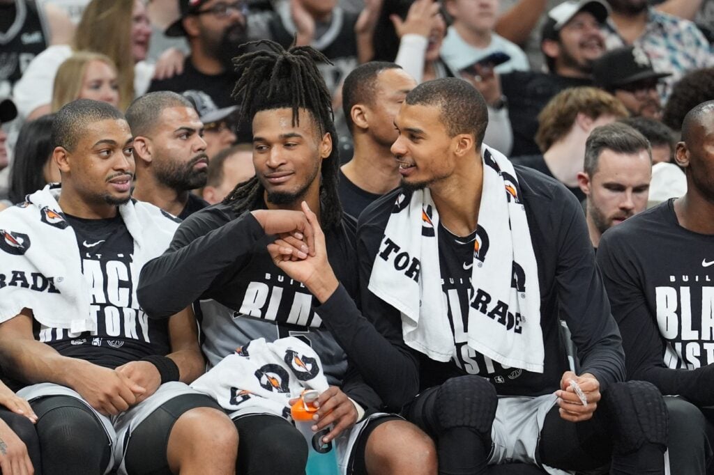 San Antonio Spurs forward Victor Wembanyama (1) shakes the hand of guard Stephon Castle (5) during the second half against Dallas Mavericks at Frost Bank Center.