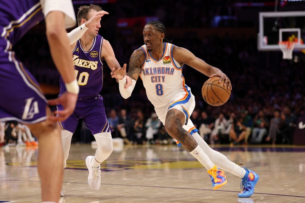 Feb 9, 2026; Los Angeles, California, USA; Oklahoma City Thunder guard Jalen Williams (8) drives to the basket against Los Angeles Lakers forward Luke Kennard (10) during the first half at Crypto.com Arena. Mandatory Credit: Kiyoshi Mio-Imagn Images