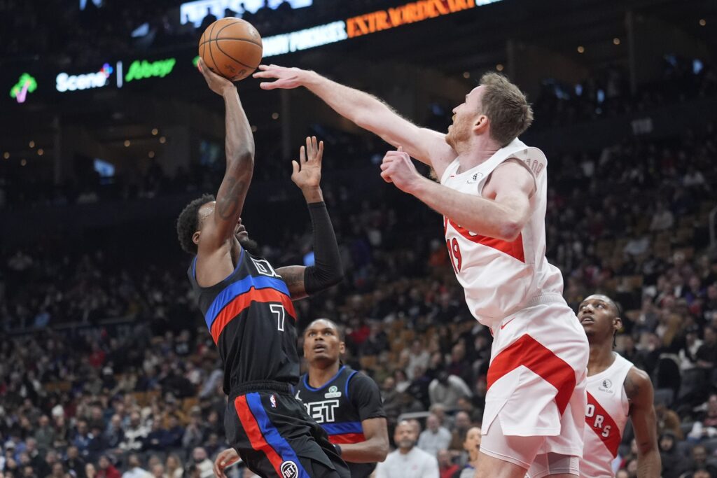 Feb 11, 2026; Toronto, Ontario, CAN; Toronto Raptors center Jakob Poeltl (19) defends against Detroit Pistons center Paul Reed (7) during the first half at Scotiabank Arena. Mandatory Credit: John E. Sokolowski-Imagn Images