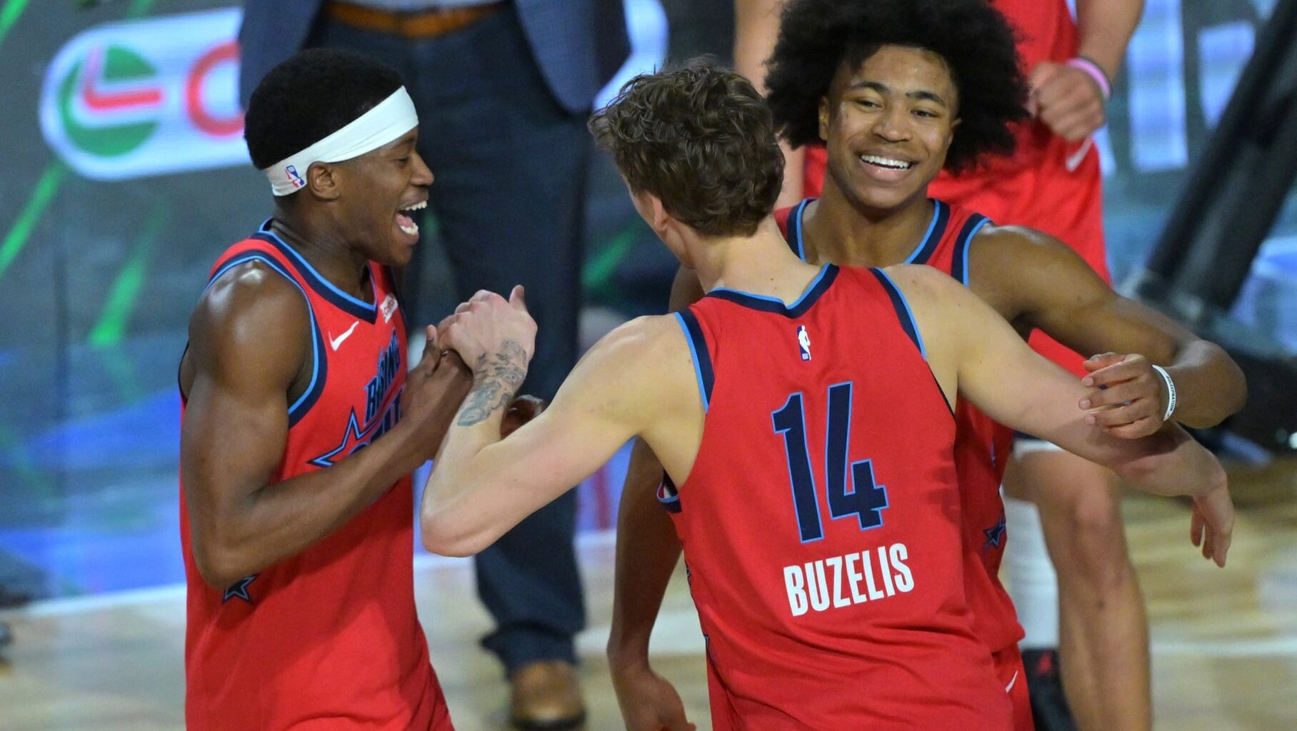 Feb 13, 2026; Inglewood, California, USA; Team Vince guard VJ Edgecombe (77) of the Philadelphia 76ers and Matas Buzelis (14) of the Chicago Bulls and Jaylen Wells (0) of the Memphis Grizzlies react during an NBA All Star Rising Stars championship game at Intuit Dome. Mandatory Credit: Jayne Kamin-Oncea-Imagn Images