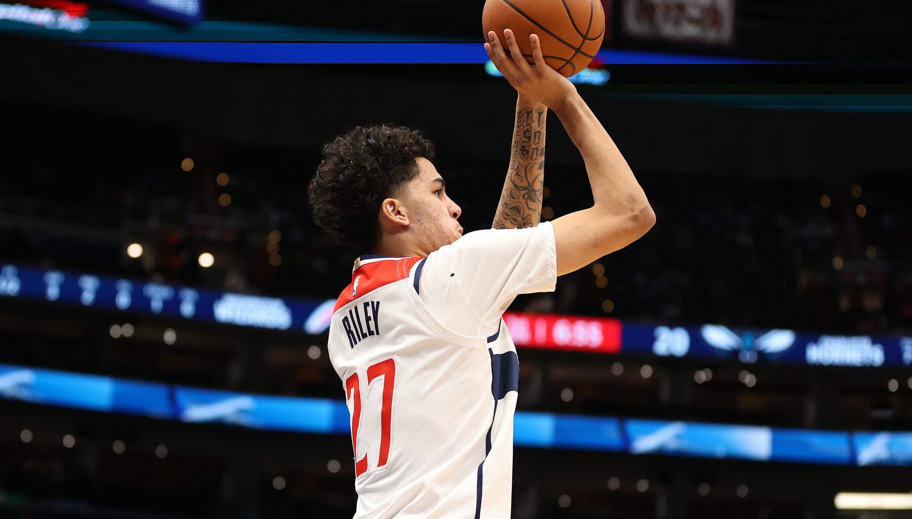Washington Wizards guard Will Riley (27) takes a shot during the first half against the Charlotte Hornets at Capital One Arena.