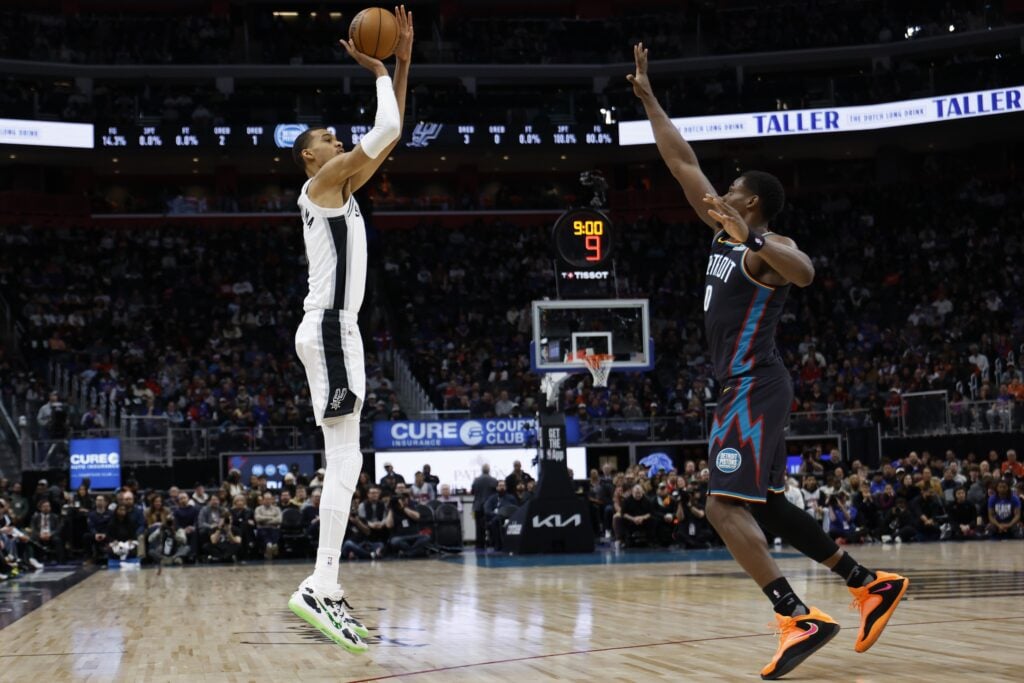 Feb 23, 2026; Detroit, Michigan, USA; San Antonio Spurs forward Victor Wembanyama (1) shoots on Detroit Pistons center Jalen Duren (0) in the first half at Little Caesars Arena. Mandatory Credit: Rick Osentoski-Imagn Images