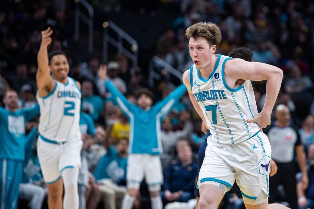 Feb 26, 2026; Indianapolis, Indiana, USA; Charlotte Hornets guard Kon Knueppel (7) celebrates a made basket in the second half against the Indiana Pacers at Gainbridge Fieldhouse. Mandatory Credit: Trevor Ruszkowski-Imagn Images