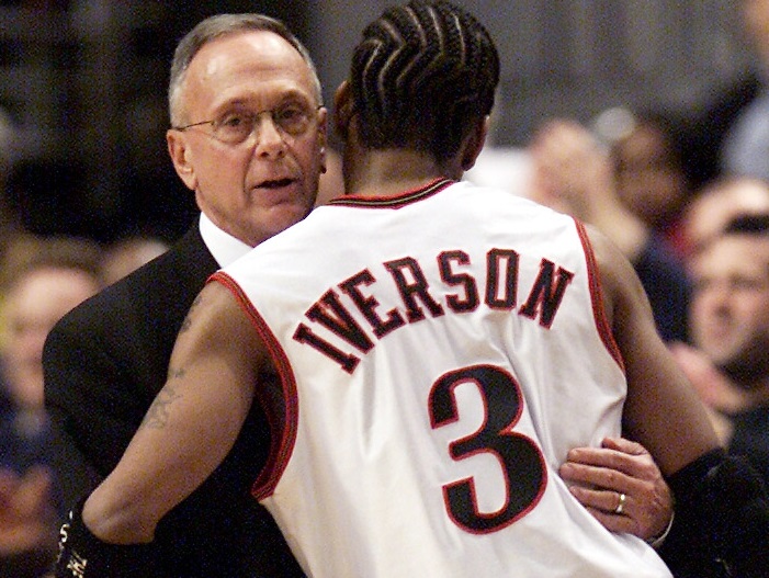 Nov 18, 2000; Philadelphia, PA, USA; Philadelphia 76ers coach Larry Brown gives Allen Iverson a hug as Iverson leaves the game in the final moments of the Philadelphia 76ers 94-73 win over the Miami Heat in Philadelphia.