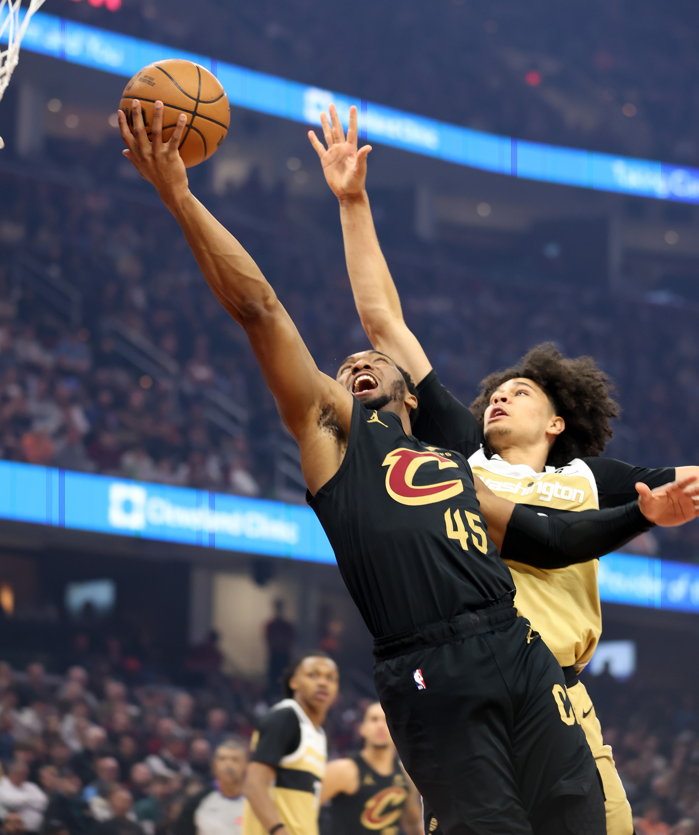 Cleveland Cavaliers guard Donovan Mitchell goes to the rim against the Washington Wizards in the first half of play. 