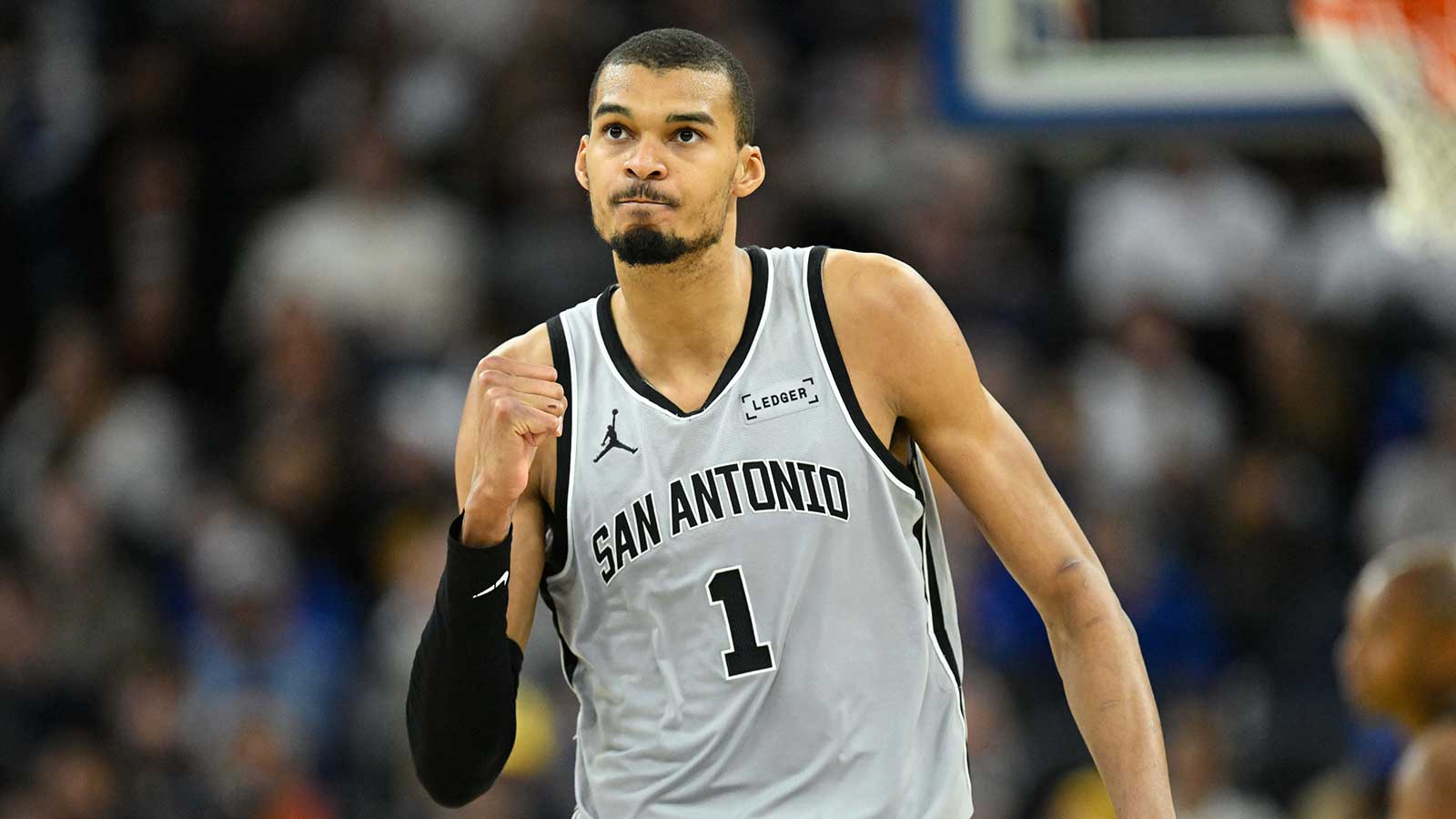 San Antonio Spurs forward Victor Wembanyama (1) celebrates a three-point basket against the Golden State Warriors in the fourth quarter at Chase Center. 