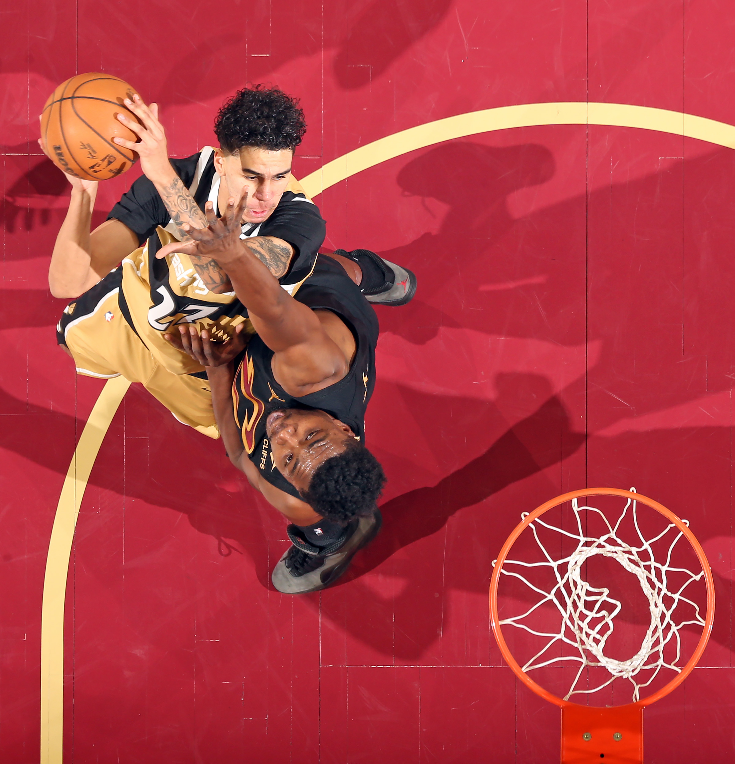 Cleveland Cavaliers center Thomas Bryant defends against Washington Wizards guard Will Riley in the first half of play. 