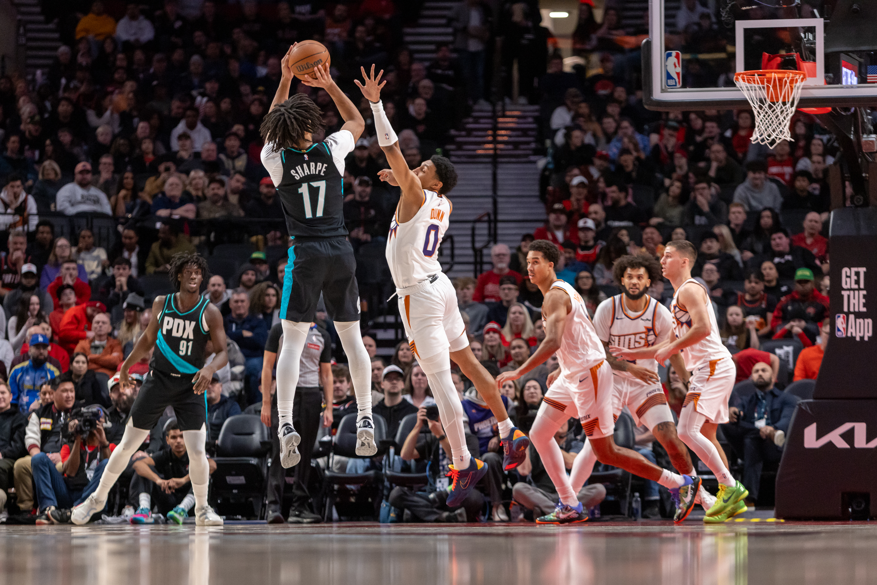 Portland Trail Blazers guard Shaedon Sharpe shoots a three-pointer during an NBA game against the Phoenix Suns at Moda Center on Tuesday, Feb. 3, 2026.