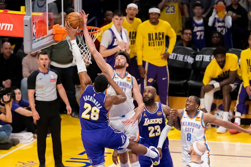 Rui Hachimura #28 of the Los Angeles Lakers lays the ball up against Chet Holmgren #7 of the Oklahoma City Thunder during an NBA basketball game, Monday February 9, 2026 in Los Angeles, Calif.