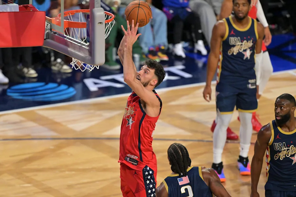 Feb 15, 2026; Inglewood, California, USA; Team USA Stars center Chet Holmgren (7) of the Oklahoma City Thunder shoots against Team USA Stripes forward Kawhi Leonard (2) of the LA Clippers in the championship game during the 75th NBA All Star Game at Intuit Dome. Mandatory Credit: Jayne Kamin-Oncea-Imagn Images
