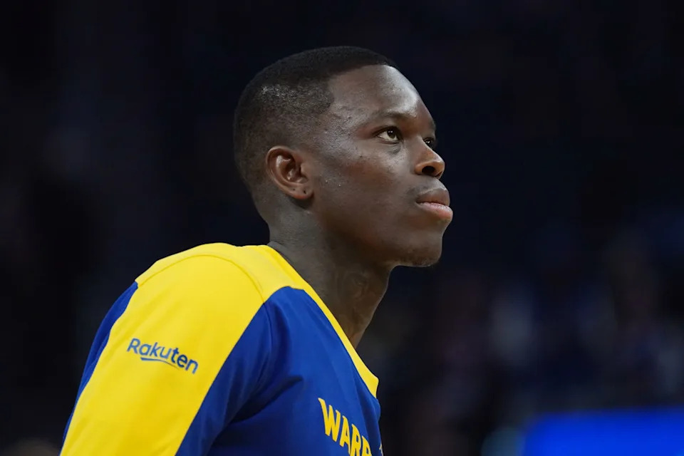 Former Golden State Warriors guard Dennis Schroder looks on before a game.David Gonzales-Imagn Images
