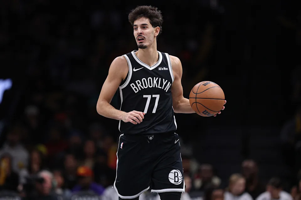 Dec 6, 2025; Brooklyn, New York, USA; Brooklyn Nets guard Ben Saraf (77) dribbles up court during the second half against the New Orleans Pelicans at Barclays Center. Mandatory Credit: Vincent Carchietta-Imagn Images