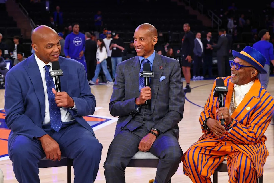 Charles Barkley, Reggie Miller, and Spike Lee smile before the game between the Indiana Pacers and the New York Knicks during Game 5 of the 2025 Eastern Conference Finals. NBAE via Getty Images
