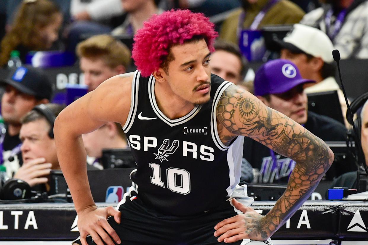 San Antonio Spurs forward Jeremy Sochan (10) stretches before substituting in during the second half against the Utah Jazz at Delta Center.