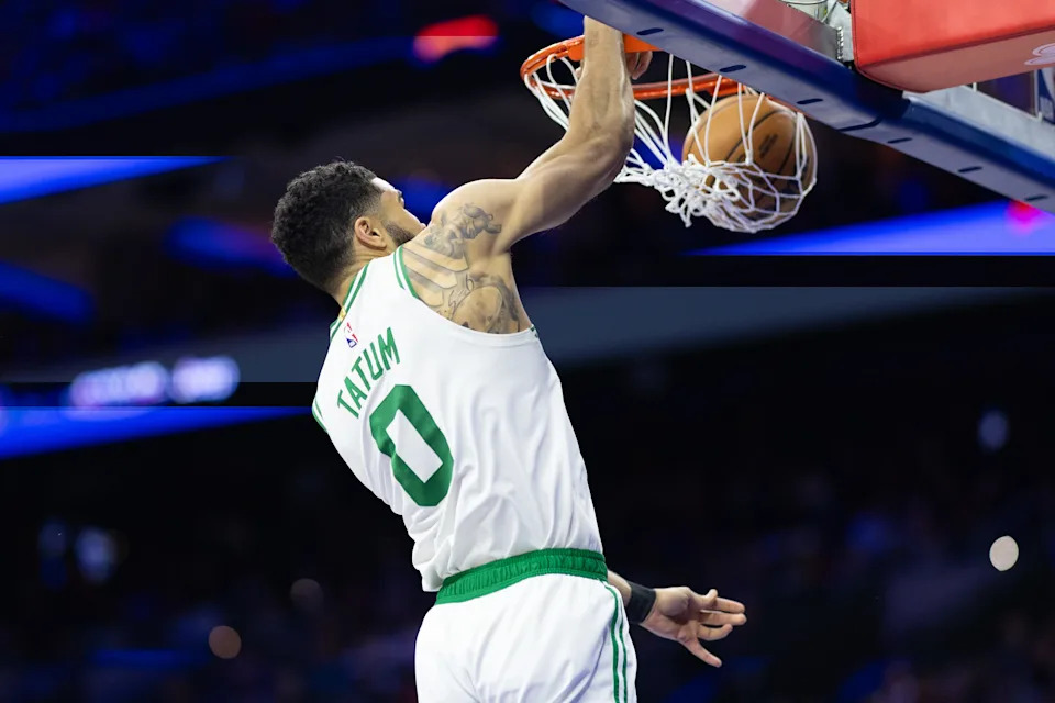 Feb 20, 2025; Philadelphia, Pennsylvania, USA; Boston Celtics forward Jayson Tatum (0) dunks the ball against the Philadelphia 76ers during the second quarter at Wells Fargo Center. Mandatory Credit: Bill Streicher-Imagn Images